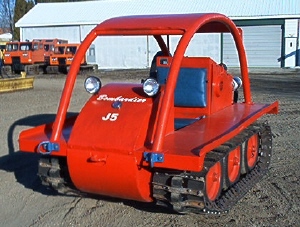 Bombardier J5, 6 cyl. 4 sp., new tracks, total reconditioned.